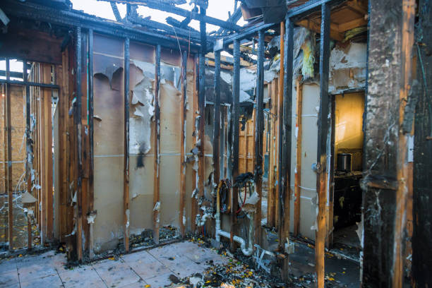 Professional Fire Damage Removal technician working in Monument Beach, MA